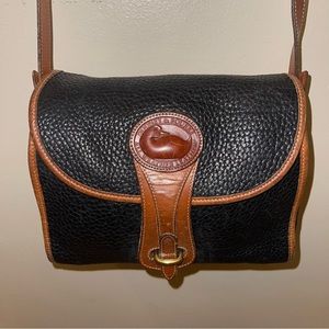 Dooney & Bourke Black with Brown Trim Pebbled Leather Crossbody Bag